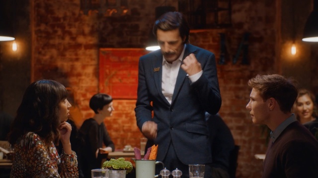 Video Reference: event, suit, restaurant, Person