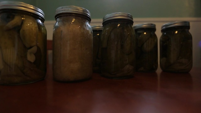 Video Reference: food preservation, pickling, mason jar, canning, pickled foods, glass bottle, condiment, bottle, Person