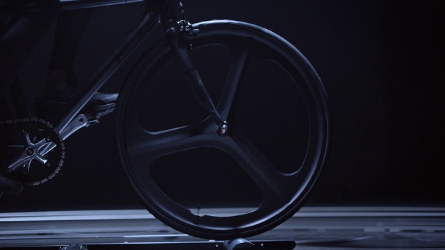 Video Reference: spoke, wheel, bicycle wheel, mode of transport, rim, light, bicycle, bicycle frame, tire, darkness