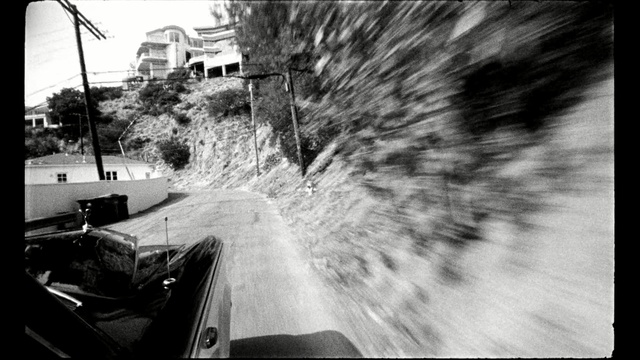 Video Reference: white, black, photograph, black and white, monochrome photography, car, photography, tree, sky, snapshot, Person
