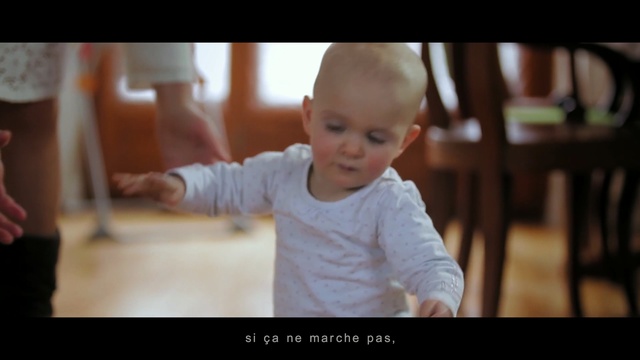 Video Reference: child, toddler, sitting, girl, fun, smile, infant, photo caption, Person