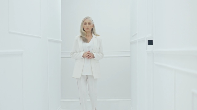 Video Reference: white, photograph, shoulder, fashion, dress, outerwear, girl, photo shoot, flooring, floor, Person