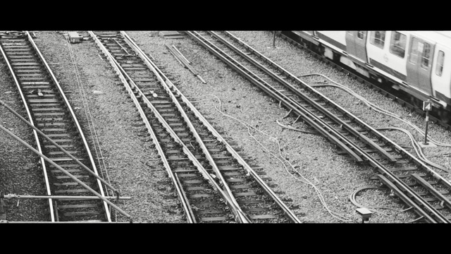 Video Reference: track, black and white, transport, monochrome photography, rail transport, monochrome, line, rolling stock, railroad car, train