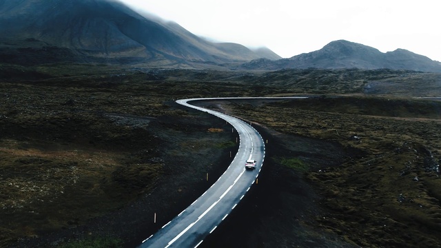 Video Reference: Road, Mountain pass, Mountainous landforms, Highland, Asphalt, Infrastructure, Highway, Road surface, Mountain, Thoroughfare
