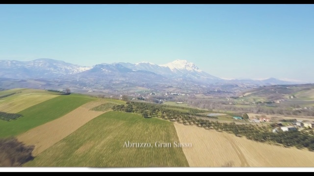 Video Reference: Mountainous landforms, Highland, Hill, Plain, Aerial photography, Grassland, Mountain range, Land lot, Mountain, Rural area