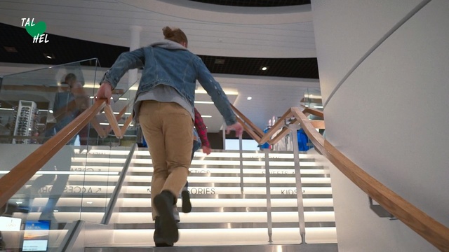 Video Reference: Stairs, Fashion, Leg, Escalator, Human leg, Waist, Person, Indoor, Man, Woman, Young, Holding, Jumping, Doing, White, Riding, Kitchen, Playing, Standing, Footwear, Clothing, Trousers, Jeans