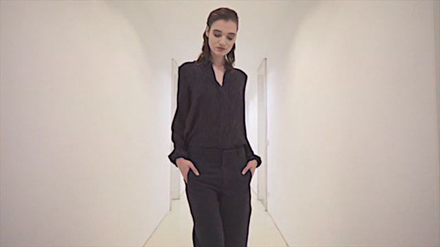 Video Reference: clothing, fashion model, shoulder, fashion, formal wear, joint, suit, neck, fashion design, fashion show, Person