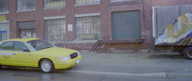 Video Reference: Land vehicle, Car, Vehicle, Yellow, Full-size car, Parking, Sedan, Compact car, Hood, Concrete