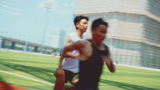 Video Reference: man, red, sports, player, athlete, sport venue, day, athletics, fun, snapshot