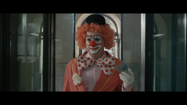 Video Reference: Clown, Facial expression, Entertainment, Performing arts, Head, Mime artist, Smile, Fiction, Fun, Temple, Person