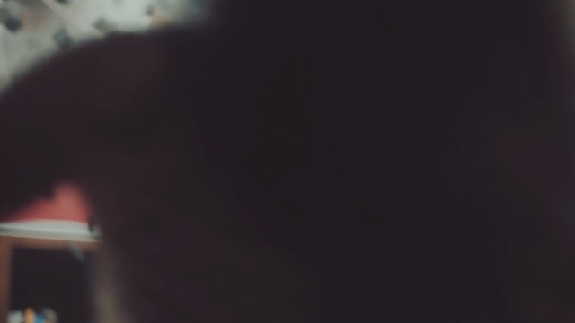 Video Reference: Black, Nose, Brown, Darkness, Sky, Photography, Room, Black hair, Neck, Cloud