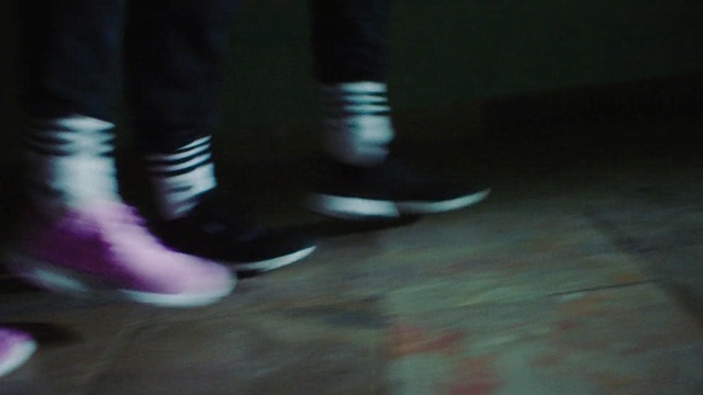 Video Reference: footwear, black, darkness, shoe, light, leg, human body, foot, night, shadow