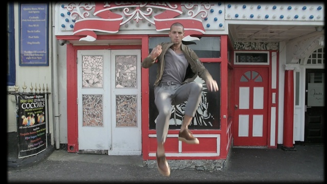 Video Reference: red, window, door, street art, street, advertising, mural, facade, Person