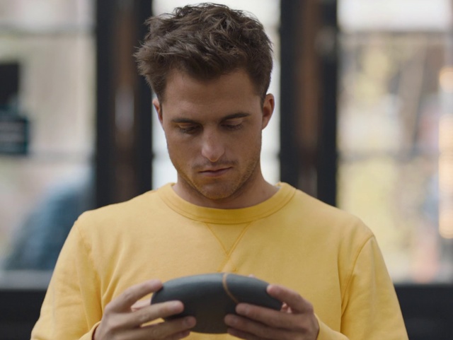 Video Reference: Shoulder, Arm, Gadget, Joint, Neck, Audio equipment, Technology, Hand, Electronic device, Chest