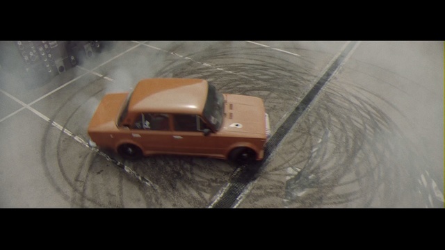 Video Reference: car, motor vehicle, vehicle, mode of transport, automotive design, automotive exterior, off roading, screenshot, dust, scale model