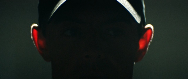 Video Reference: Black, Red, Audio equipment, Headgear, Photography, Ear, Fictional character, Black hair