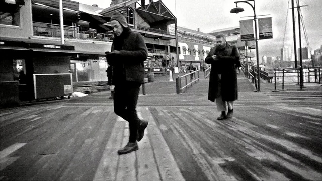 Video Reference: black, white, photograph, road, urban area, black and white, street, infrastructure, pedestrian, monochrome photography, Person