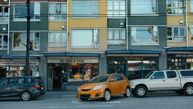 Video Reference: car, urban area, vehicle, city, motor vehicle, luxury vehicle, metropolitan area, transport, street, town