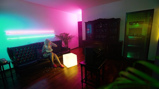 Video Reference: room, entertainment, light, lighting, table, interior design, house, electronic device, audio, furniture