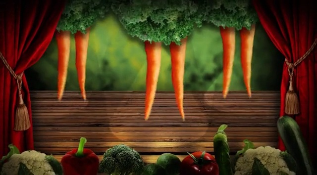 Video Reference: Nature, Vegetable, Cruciferous vegetables, Broccoli, Leaf vegetable, Theatrical scenery, Still life photography, Heater, Plant, Performing arts, Table, Red, Sitting, Food, Cake, Front, Small, Couple, Orange, Standing, Large, Wooden, Green, Group, Knife, Colorful, Woman, Holding, Board, Man, White, Plate