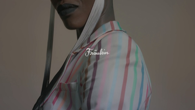 Video Reference: shoulder, fashion, outerwear, clothes hanger, neck