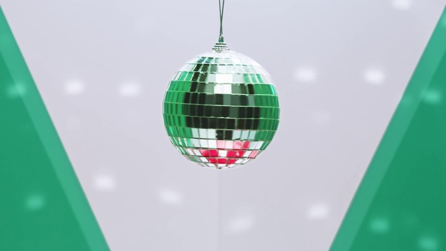 Video Reference: Green, Turquoise, Christmas ornament, Lighting, Ornament, Christmas decoration, Holiday ornament, Design, Pattern, Interior design, Sitting, Monitor, Computer, Man, White, Sign