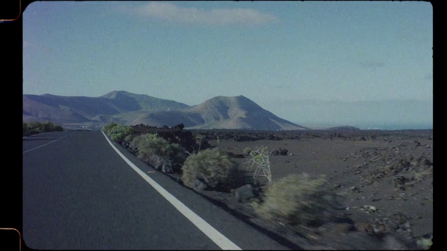 Video Reference: Road, Mountainous landforms, Sky, Highway, Thoroughfare, Infrastructure, Asphalt, Highland, Mountain, Mountain pass