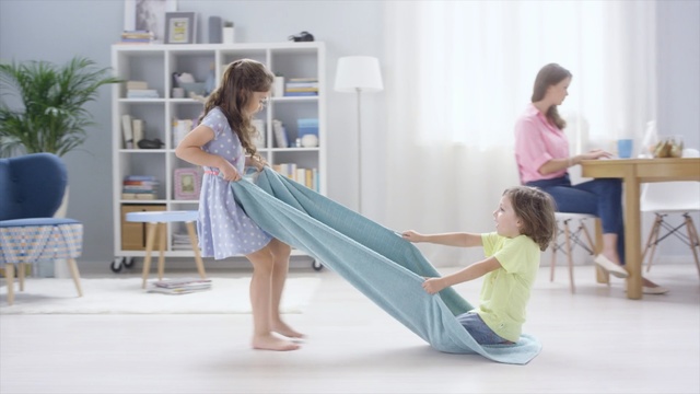 Video Reference: Furniture, Dress, Leg, Table, Leisure, Sitting, Room, Textile, Interior design, Linens, Person