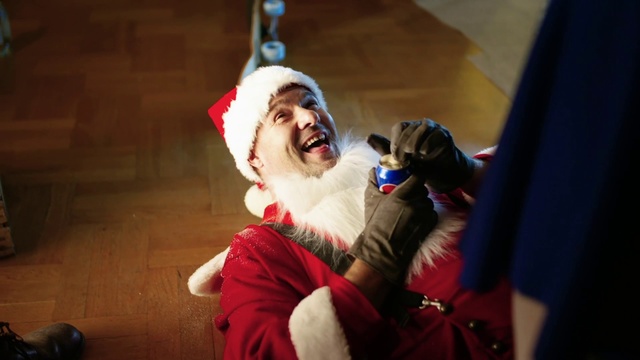 Video Reference: Santa claus, Christmas, Facial hair, Fun, Fur, Beard, Fictional character, Human body, Sporting Group, Laugh