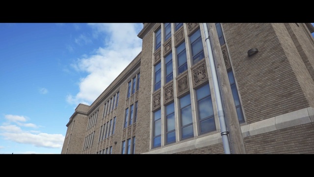 Video Reference: Sky, Daytime, Architecture, Urban area, Building, Town, Facade, City, Metropolitan area, Cloud