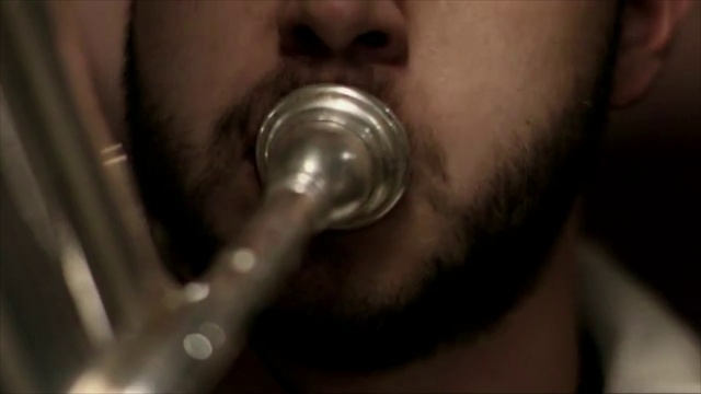 Video Reference: Face, Hair, Facial hair, Lip, Close-up, Skin, Nose, Mouth, Neck, Organ