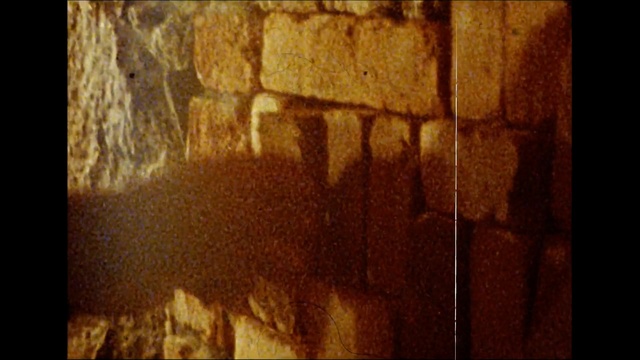 Video Reference: Brown, Yellow, Wall, Orange, Art, Wood, Modern art, Pattern, Visual arts, Heat, Person