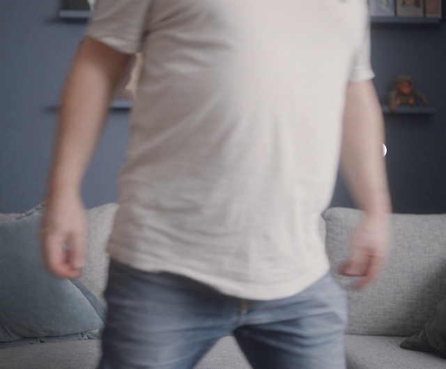 Video Reference: White, Shoulder, Clothing, T-shirt, Jeans, Standing, Arm, Joint, Neck, Waist