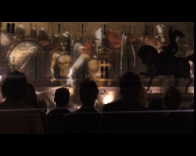 Video Reference: black, darkness, religion, crowd, light, performance art, audience, night, temple, screenshot, Person