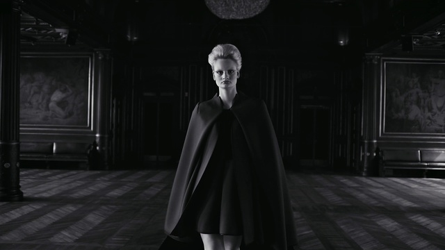 Video Reference: Black, Photograph, Darkness, Fashion, Snapshot, Black-and-white, Monochrome, Screenshot, Outerwear, Photography, Person