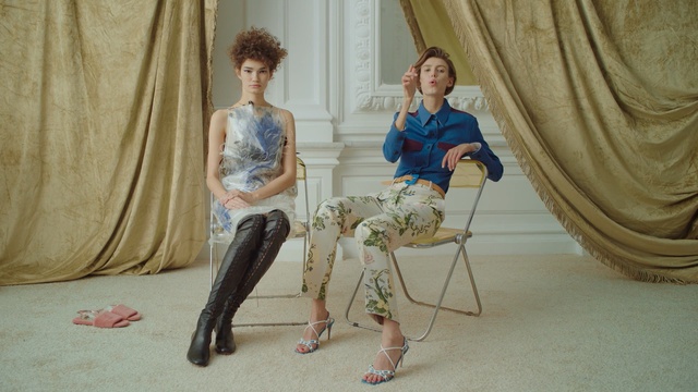 Video Reference: sitting, fashion, girl, human behavior, shoe, fun, art, Person