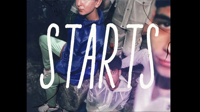 Video Reference: Photograph, Cool, Snapshot, Font, Album cover, Human, Photo caption, Photography, Outerwear, Fun, Sitting, Man, Photo, Small, Table, Holding, Pair, Black, Woman, Little, Standing, Boy, Wearing, Young, Group, White, Phone, Playing, Text, Clothing, Human face, Person