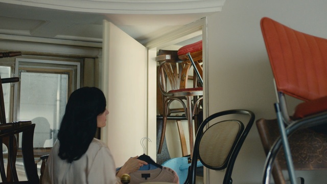 Video Reference: room, furniture, interior design, house, window, chair, product, ceiling, Person