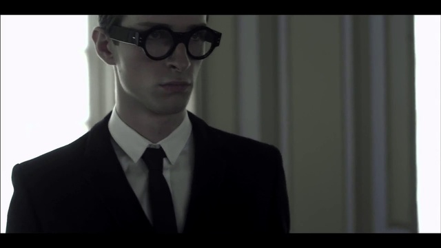 Video Reference: Eyewear, Suit, Glasses, Sunglasses, Formal wear, Vision care, White-collar worker, Cool, Tie, Tuxedo