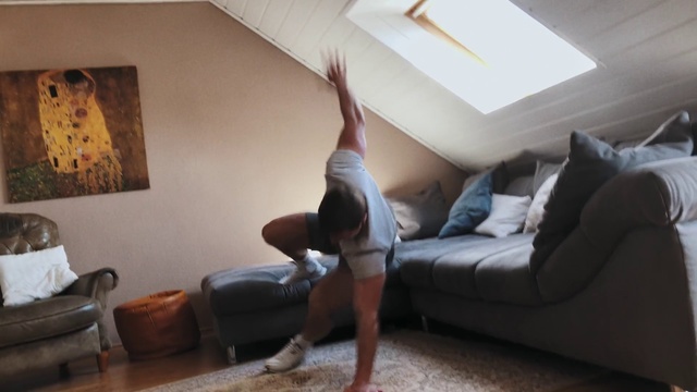 Video Reference: Leg, Room, Joint, Floor, Furniture, Ceiling, Hardwood, Stretching, Sportswear, Flooring