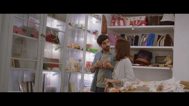 Video Reference: room, girl, product, interior design, window, display window, shelving, furniture, Person