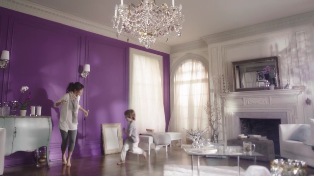Video Reference: purple, room, interior design, ceiling, living room, function hall, furniture, home, decor, dining room, Person