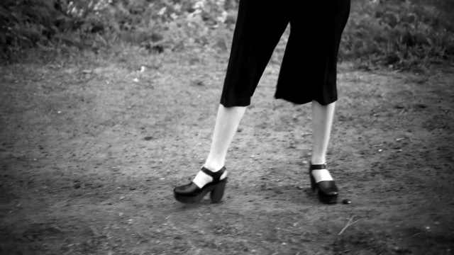 Video Reference: photograph, white, black, black and white, footwear, monochrome photography, photography, leg, light, shoe, Person