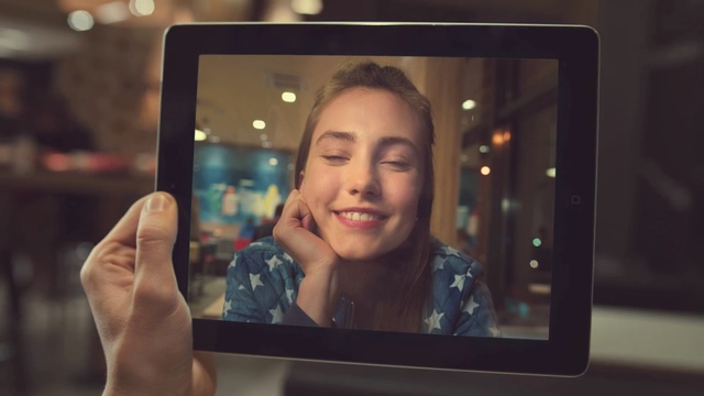 Video Reference: electronic device, photography, technology, selfie, gadget, girl, display device, media, television, product, Person
