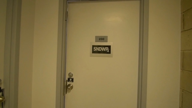 Video Reference: door, plumbing fixture, toilet, public toilet, Person