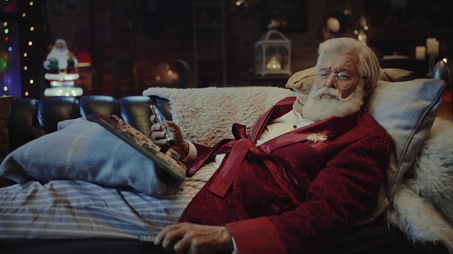 Video Reference: Human, Room, Fictional character, Reading, Glasses, Furniture, Couch, Screenshot