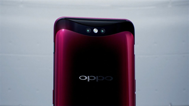 Video Reference: mobile phone, feature phone, gadget, product, electronic device, magenta, telephony, communication device, product, portable communications device