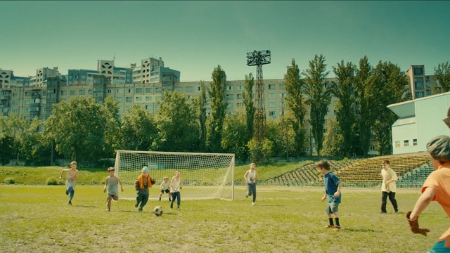 Video Reference: sports, leisure, sport venue, structure, grass, recreation, sky, tree, team sport, fun, Person