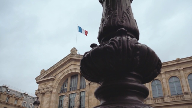 Video Reference: Statue, Landmark, Monument, Sculpture, Flag, Sky, Art, Memorial, Architecture, Temple, Person