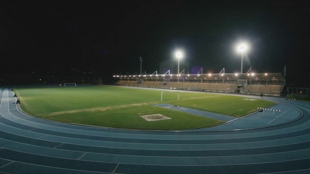 Video Reference: Sport venue, Stadium, Atmosphere, Light, Grass, Night, Lighting, Artificial turf, Team sport, Line